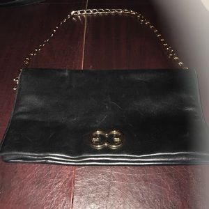 Escada leaving clutch bag